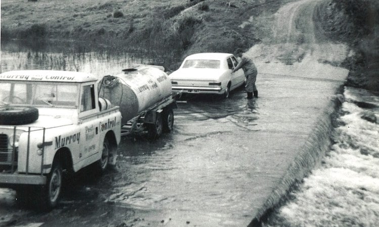 old photo of cars on water
